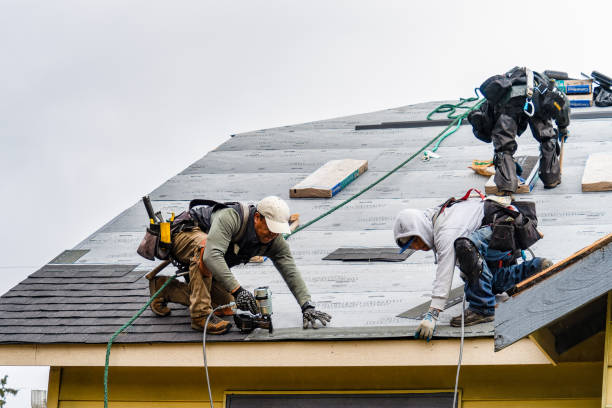 Professional Storm Damage Roof Repair technician working in New Oxford, PA